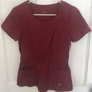 Jaanuu Peplum Scrub Top